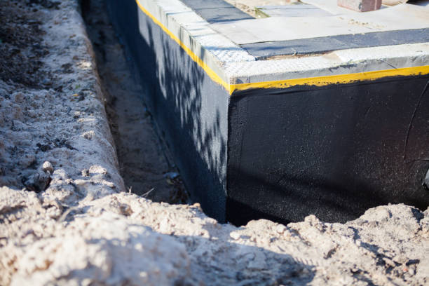 Professional Basement Waterproofing technician working in Camas, WA